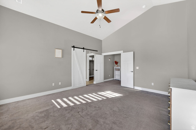 14714 South Bright Wood Road Herriman, UT 84096 - Photo 20 of 41 Primary Bedroom featuring the sliding barn door