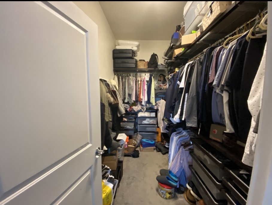 3300 West Irving Park Road, Unit H5 Chicago, IL 60618 - Photo 15 of 21 a view of walk in closet with clothes and shoes