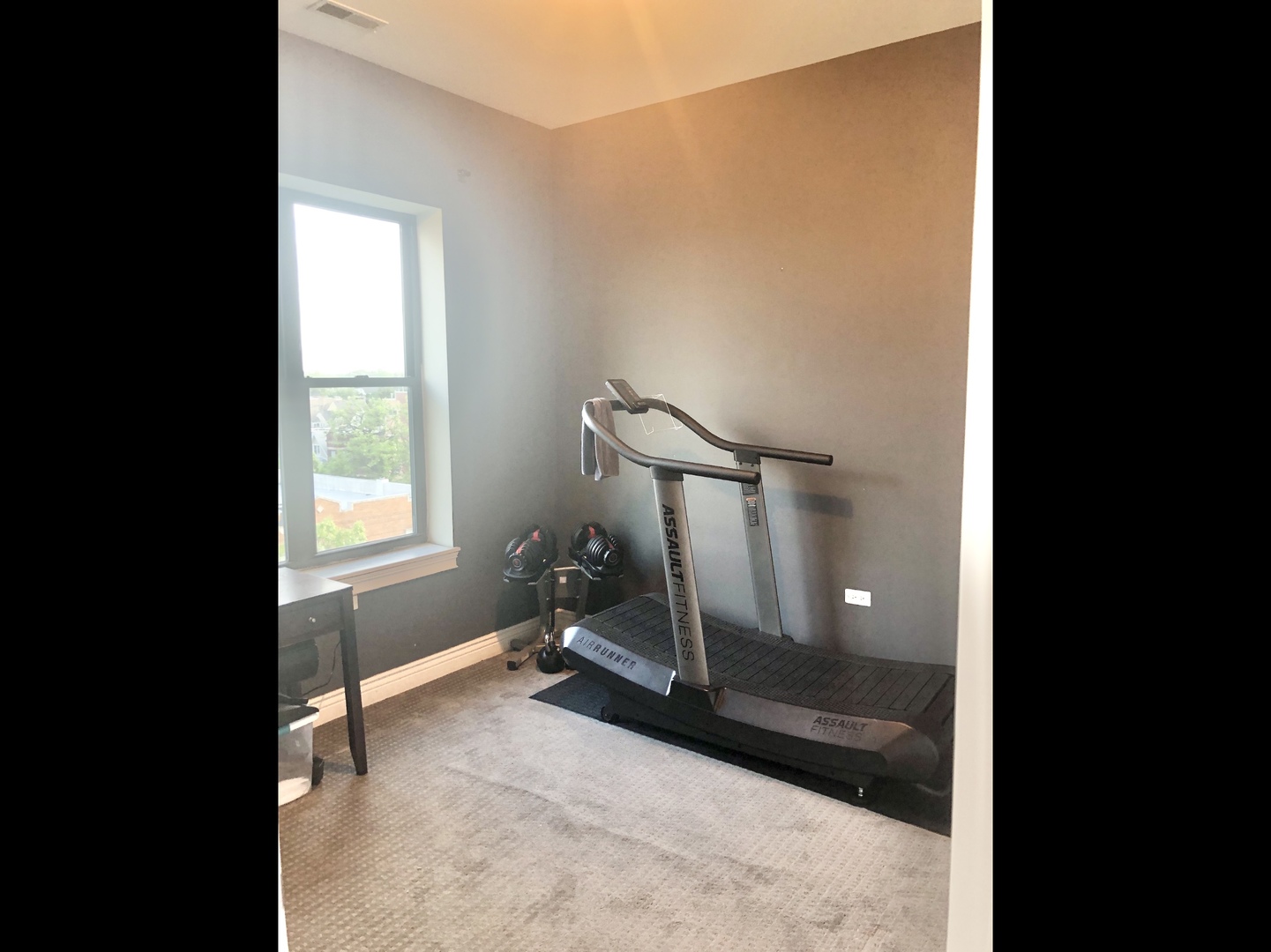 3300 West Irving Park Road, Unit H5 Chicago, IL 60618 - Photo 17 of 21 a view of an empty room with a window