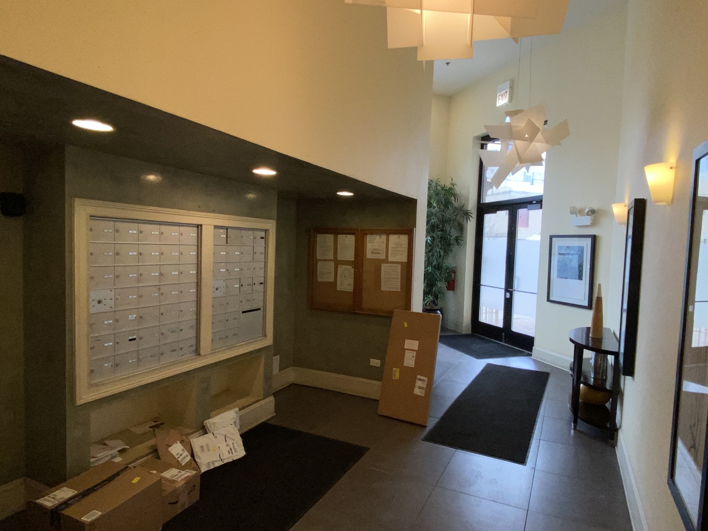 3300 West Irving Park Road, Unit H5 Chicago, IL 60618 - Photo 4 of 21 a lobby with furniture and wooden floor