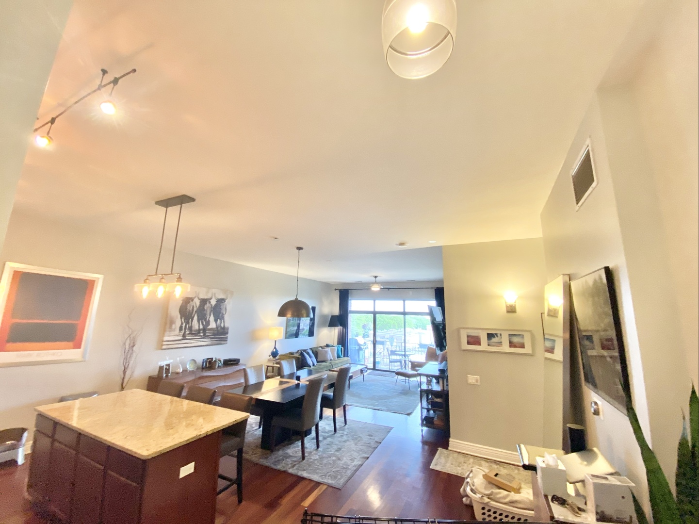 3300 West Irving Park Road, Unit H5 Chicago, IL 60618 - Photo 5 of 21 a living room with dining room and wooden floor
