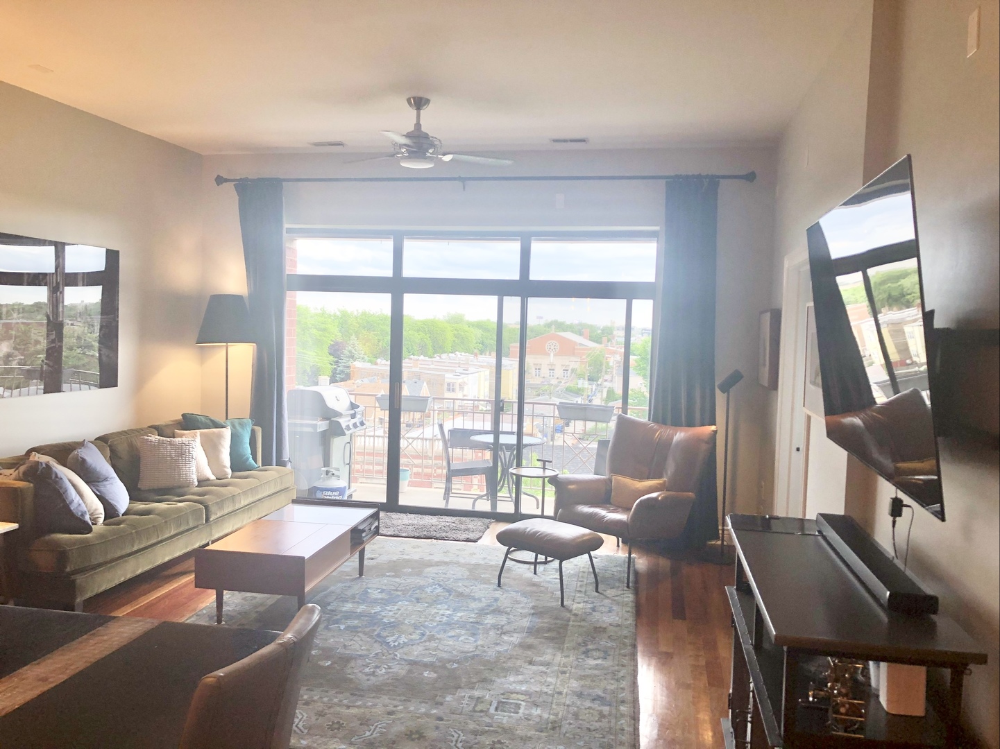 3300 West Irving Park Road, Unit H5 Chicago, IL 60618 - Photo 7 of 21 a living room with furniture and large windows
