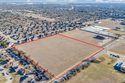 a view of a lake with a city