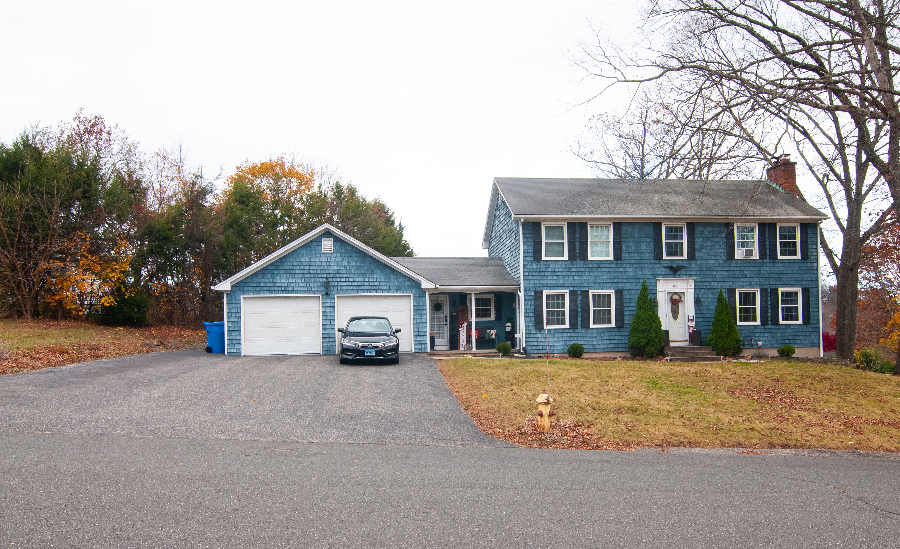a view of large house with a yard
