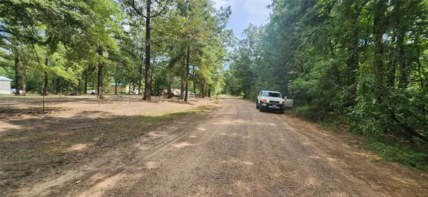 a view of road with trees
