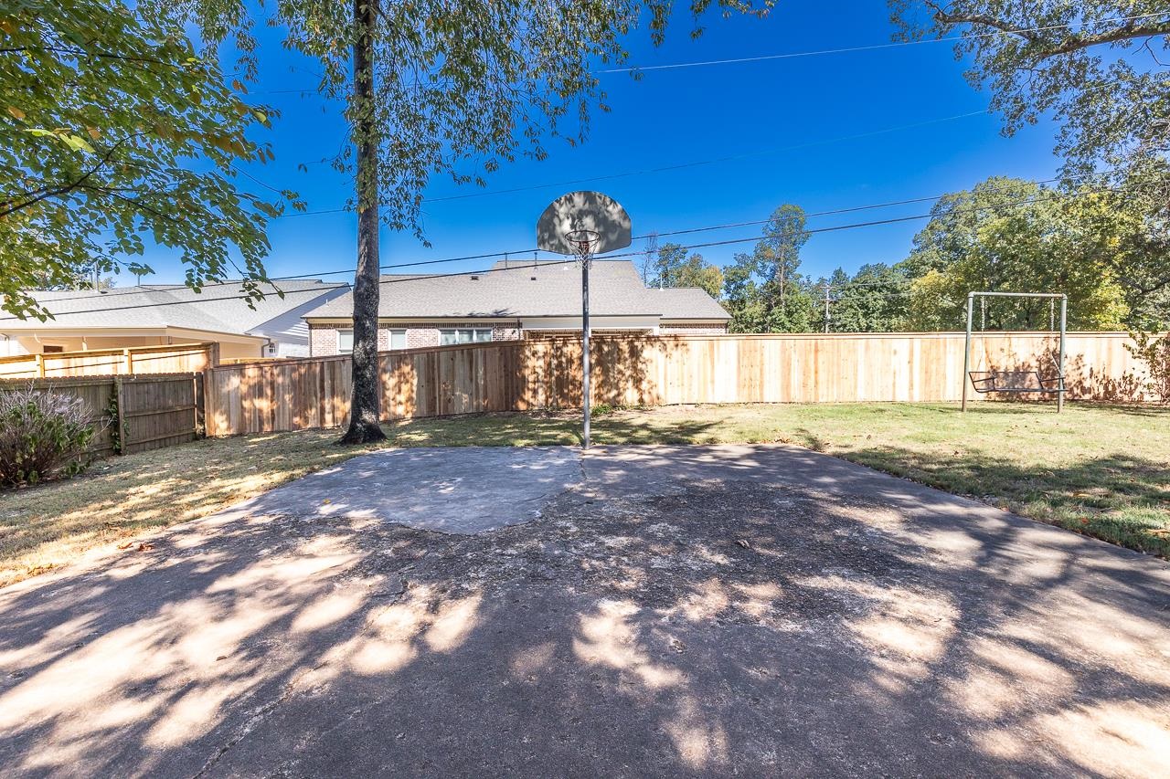 5390 Sea Isle Road Memphis, TN 38119 - Photo 32 of 35 a view of a yard with an trees