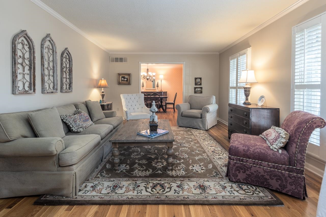 5390 Sea Isle Road Memphis, TN 38119 - Photo 5 of 35 a living room with furniture large window and wooden floor