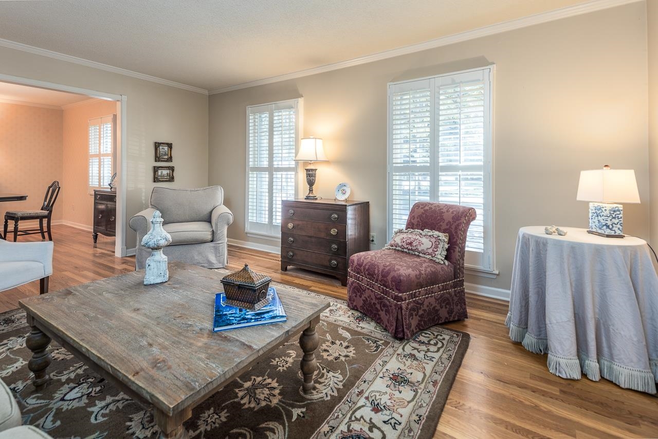 5390 Sea Isle Road Memphis, TN 38119 - Photo 6 of 35 a living room with furniture and a fireplace