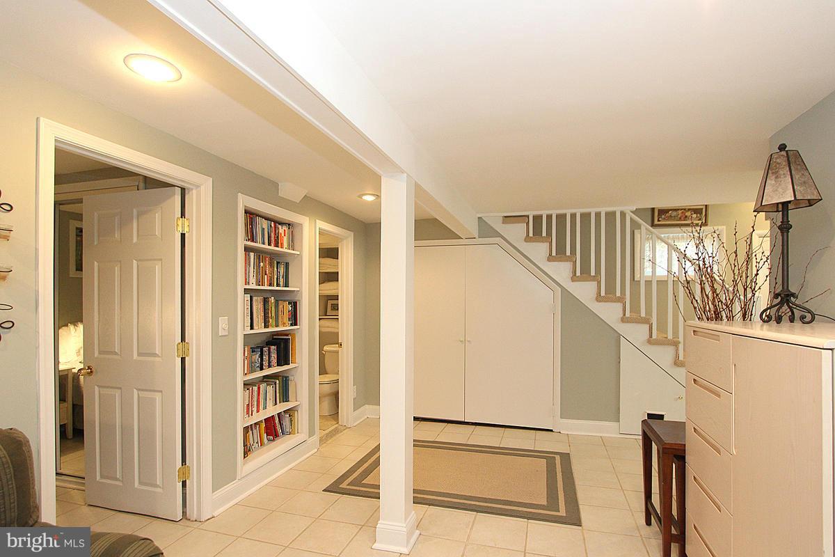 5923 Conway Road Bethesda, MD 20817 - Photo 21 of 26 Built-in shelving, Laundry Area
