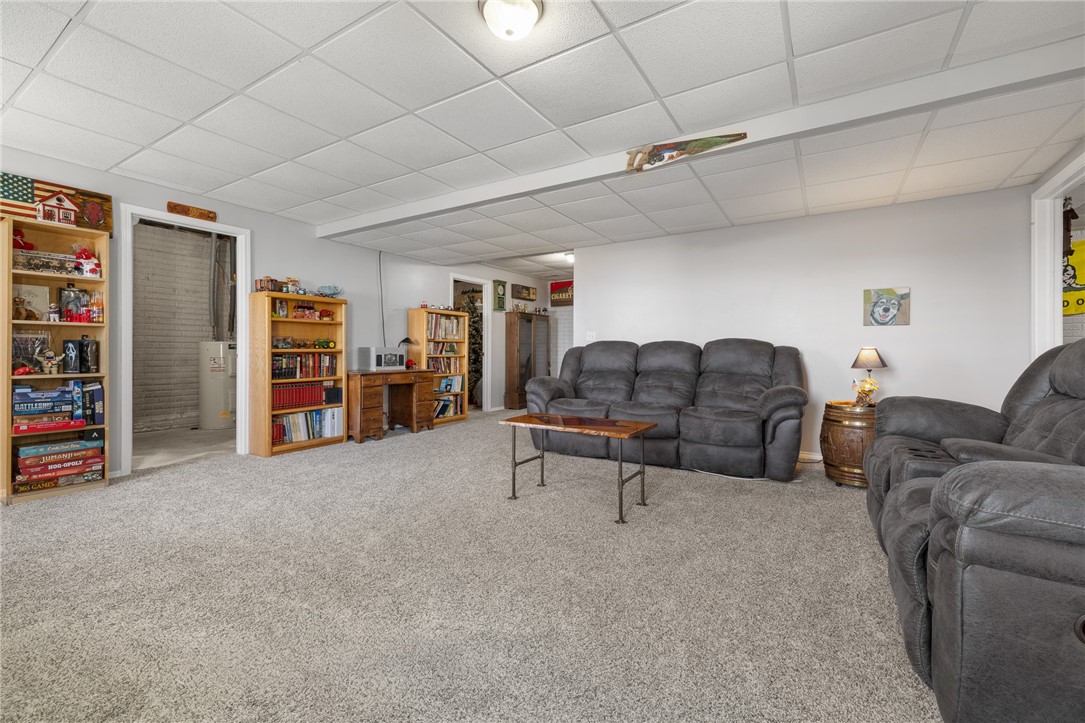 10974 Ricks Drive Harrison, AR 72601 - Photo 34 of 59 Living room with a paneled ceiling and carpet