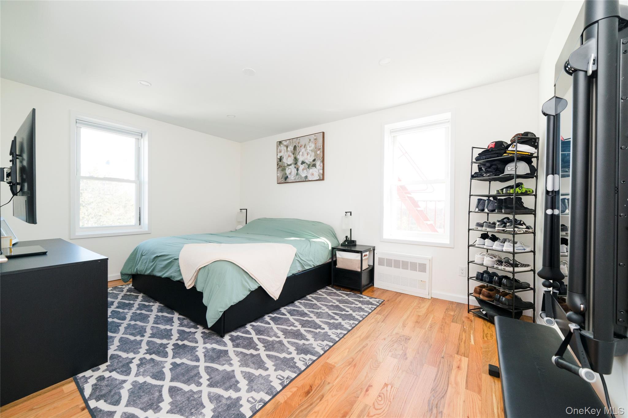 90 Union Street, Unit 5G New Rochelle, NY 10805 - Photo 11 of 18 a bedroom with a bed and a window