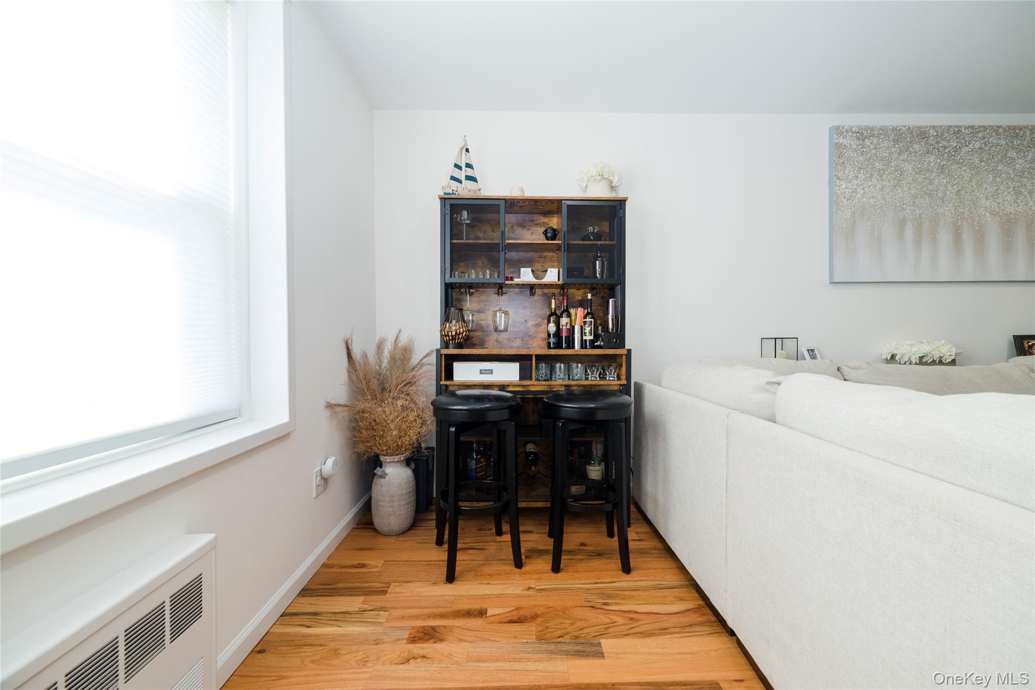 90 Union Street, Unit 5G New Rochelle, NY 10805 - Photo 16 of 18 a workspace with furniture and a rug