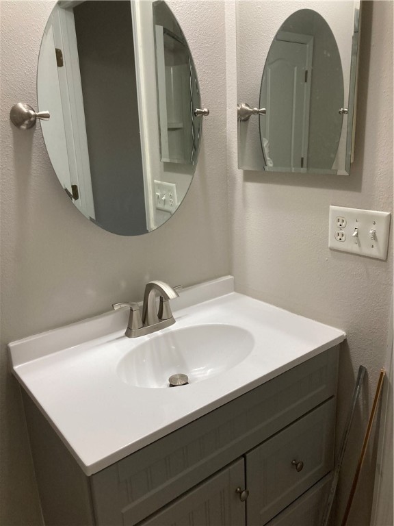 76222 Long Pond Loop Yulee, FL 32097 - Photo 6 of 6 a bathroom with 2 sink and a mirror