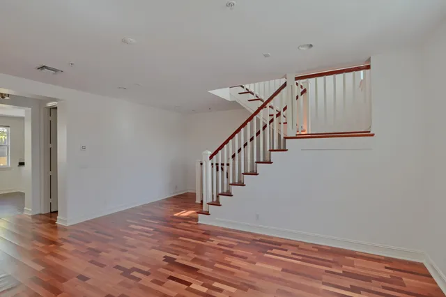a view of entryway with wooden floor