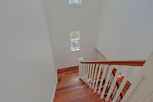 wooden floor and closet in a en suite bathroom