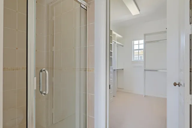 a view of a storage & utility room with a washer dryer
