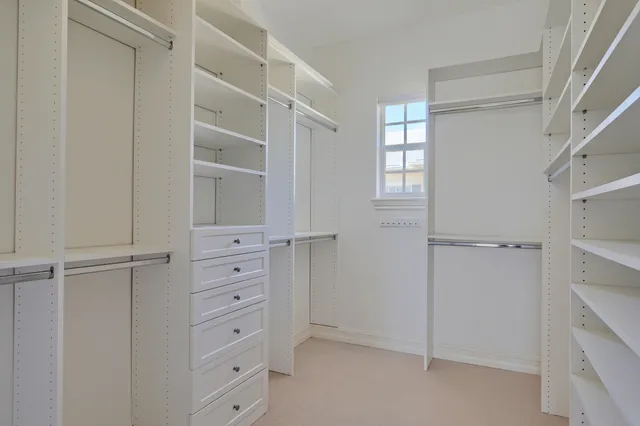 a view of a street with a building in the background