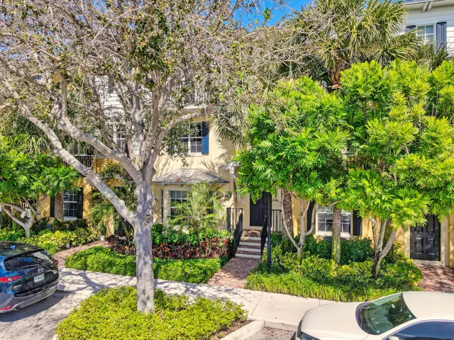 a view of a backyard with plants