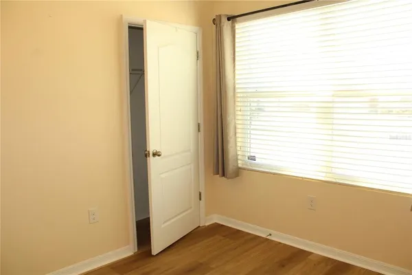 a view of a room that has a window in it