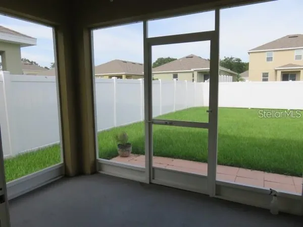 a view of a porch with backyard