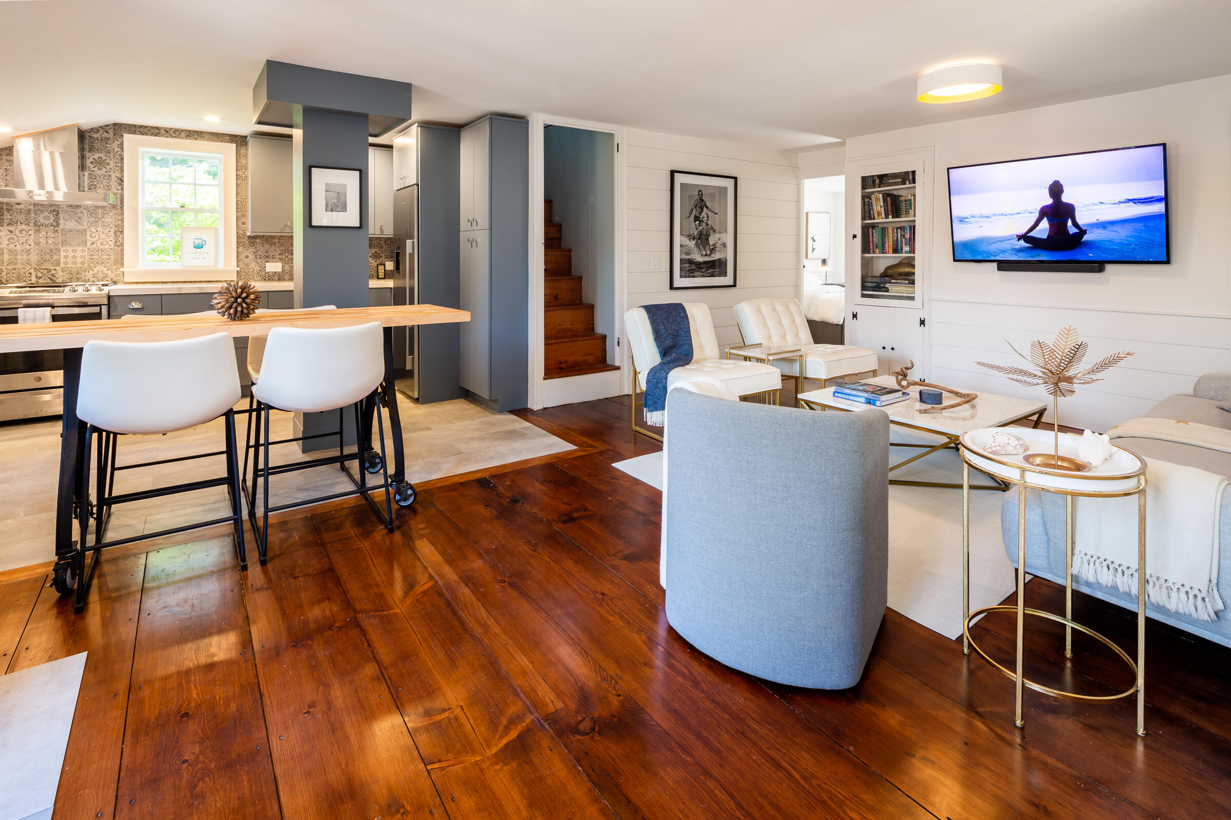 591 Crowell Road North Chatham, MA 02633 - Photo 2 of 58 a living room with dining room and wooden floor