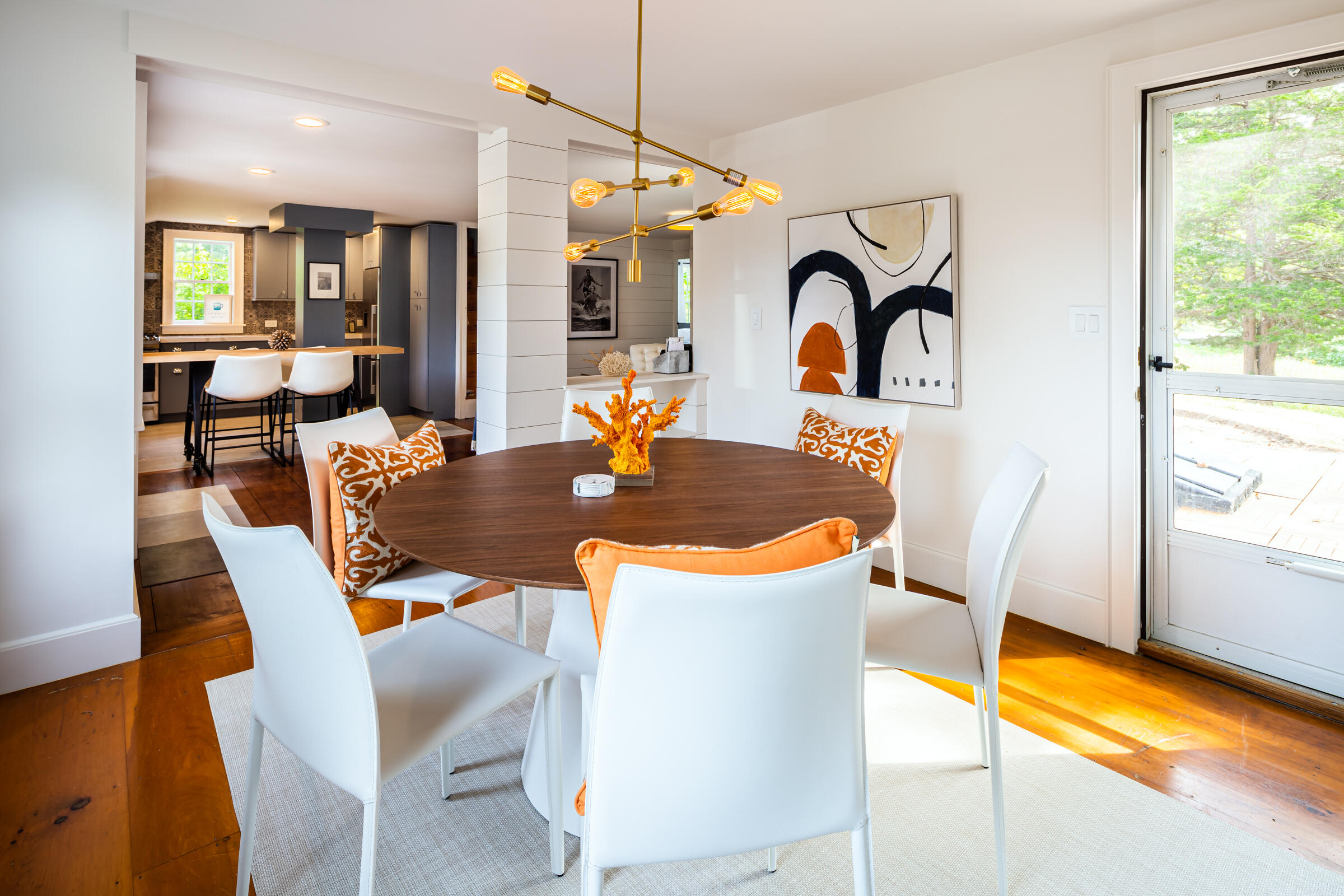 591 Crowell Road North Chatham, MA 02633 - Photo 4 of 58 a dining room with a table and chairs in it