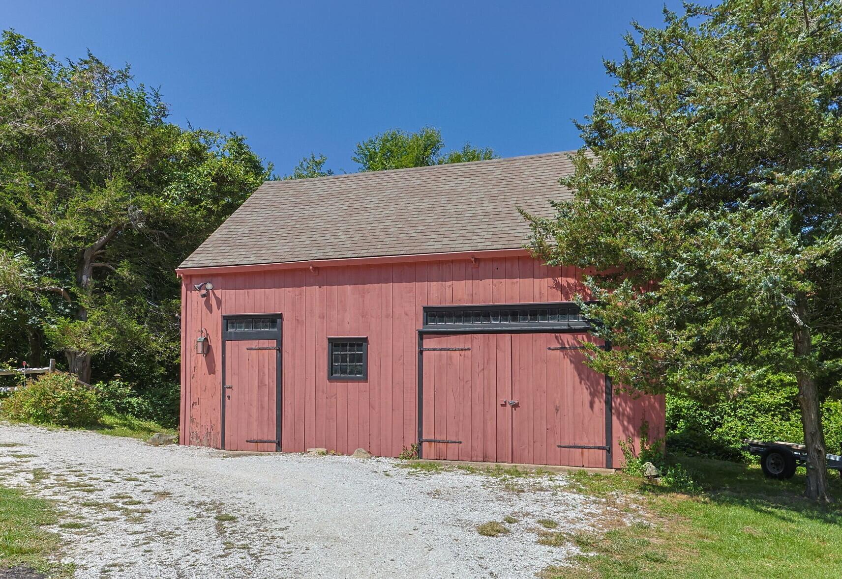 591 Crowell Road North Chatham, MA 02633 - Photo 47 of 58 a front view of a house with a yard
