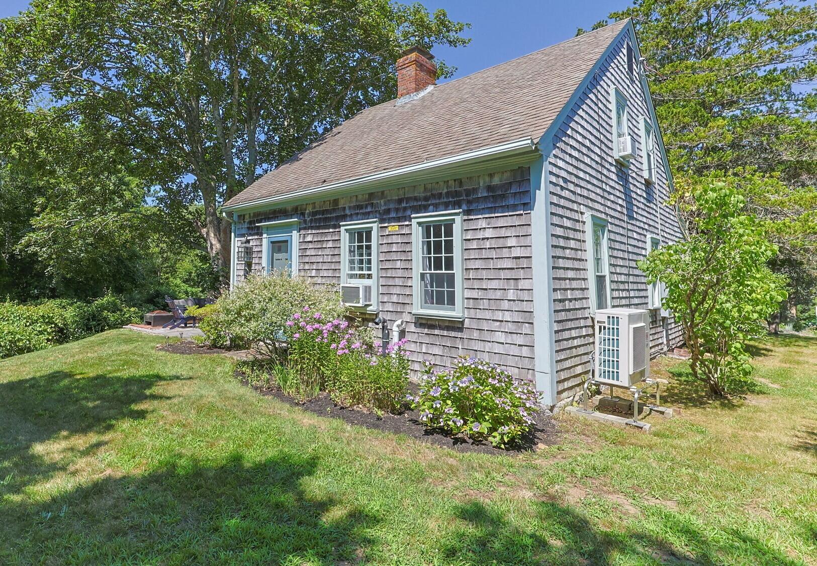 591 Crowell Road North Chatham, MA 02633 - Photo 48 of 58 58-web-or-mls-591-crowell-rd-Side of Hou