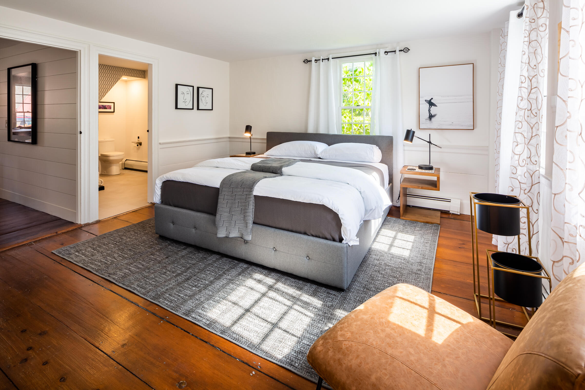 591 Crowell Road North Chatham, MA 02633 - Photo 5 of 58 a spacious bedroom with a bed and window