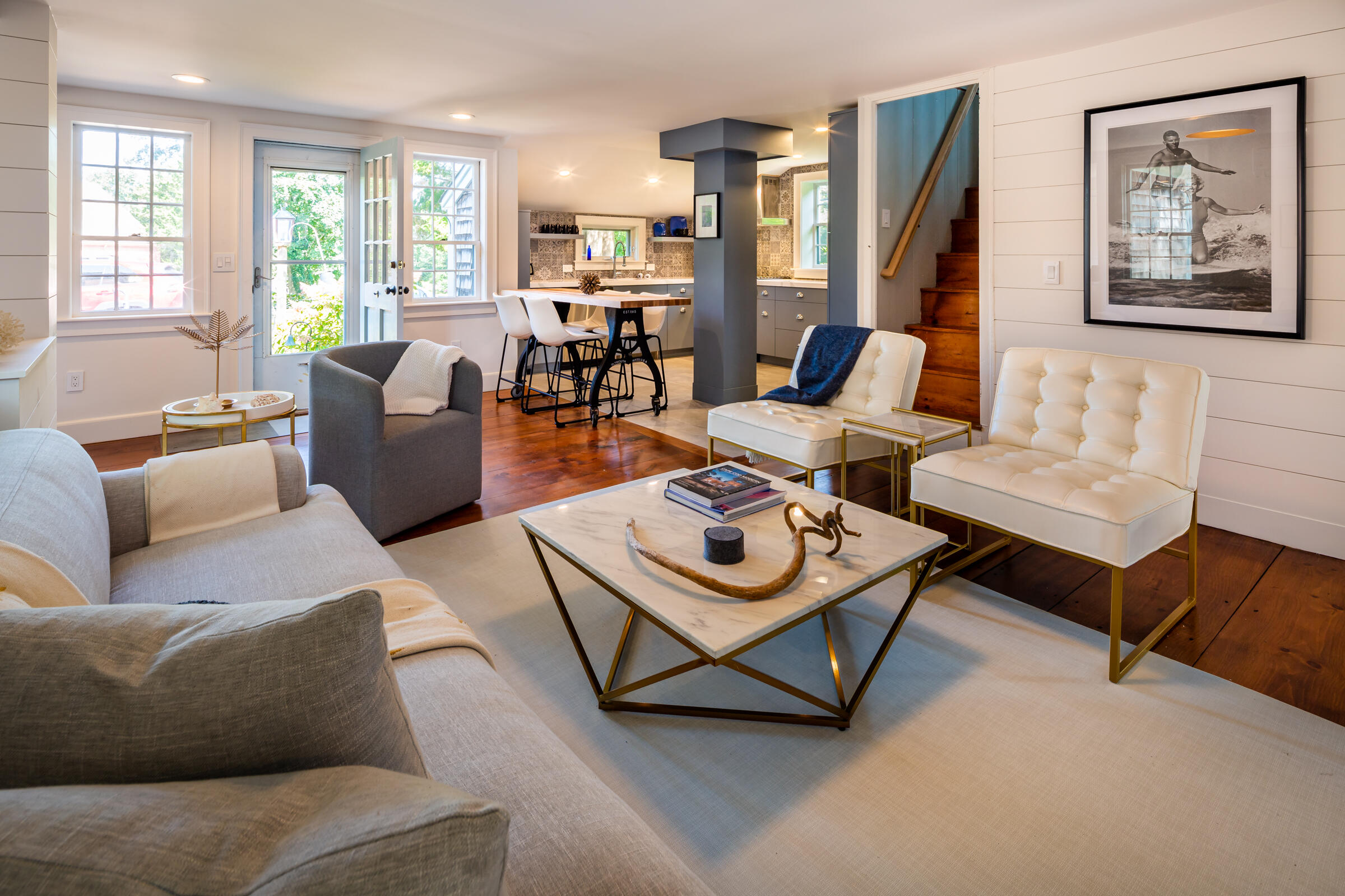 591 Crowell Road North Chatham, MA 02633 - Photo 7 of 58 a living room with furniture a rug and a large window