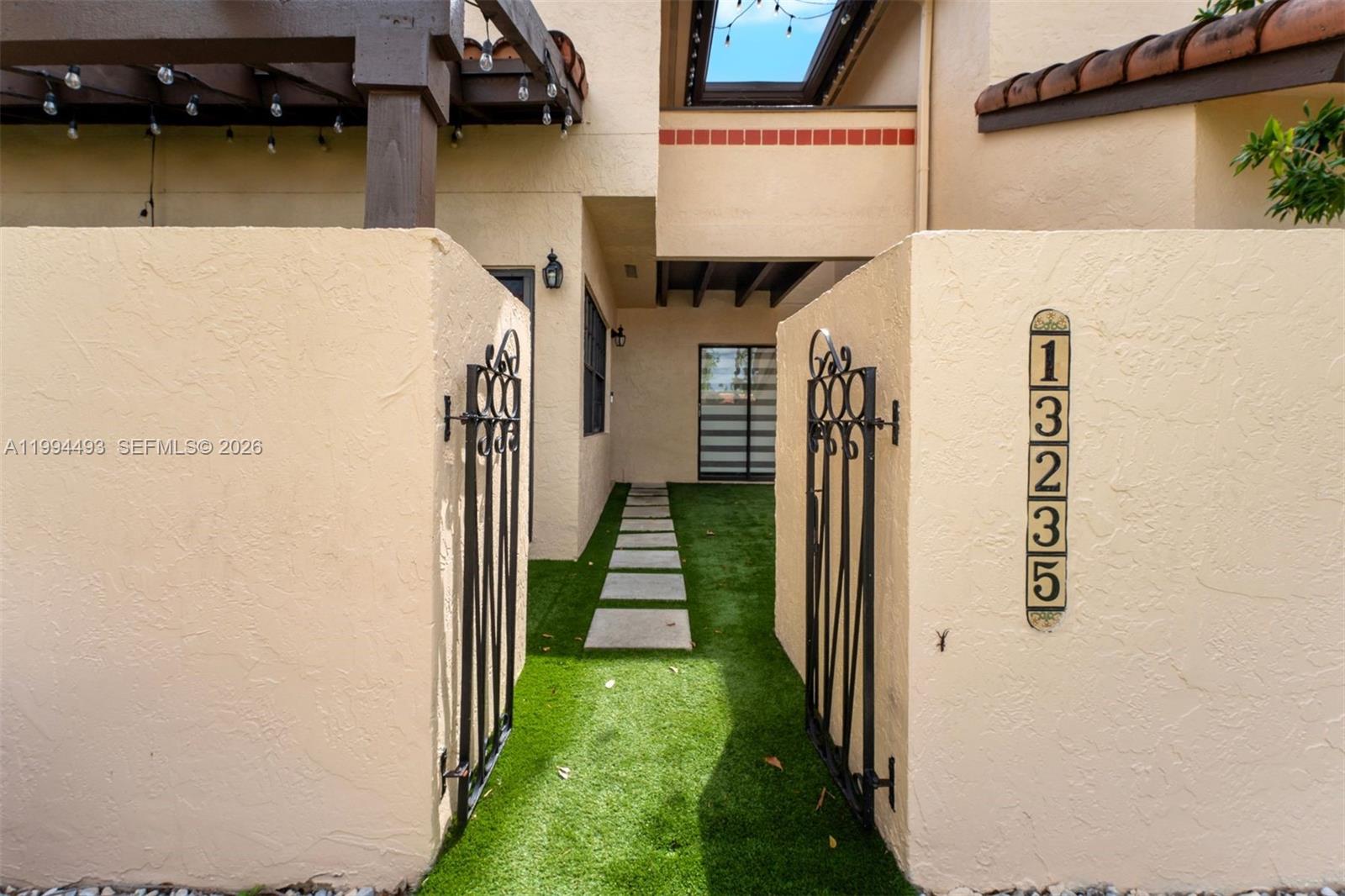 13235 Southwest 114th Terrace Miami, FL 33186 - Photo 2 of 26 a view of a house with a backyard