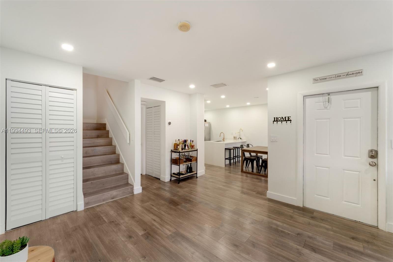 13235 Southwest 114th Terrace Miami, FL 33186 - Photo 10 of 26 a view of dining room with furniture and wooden floor