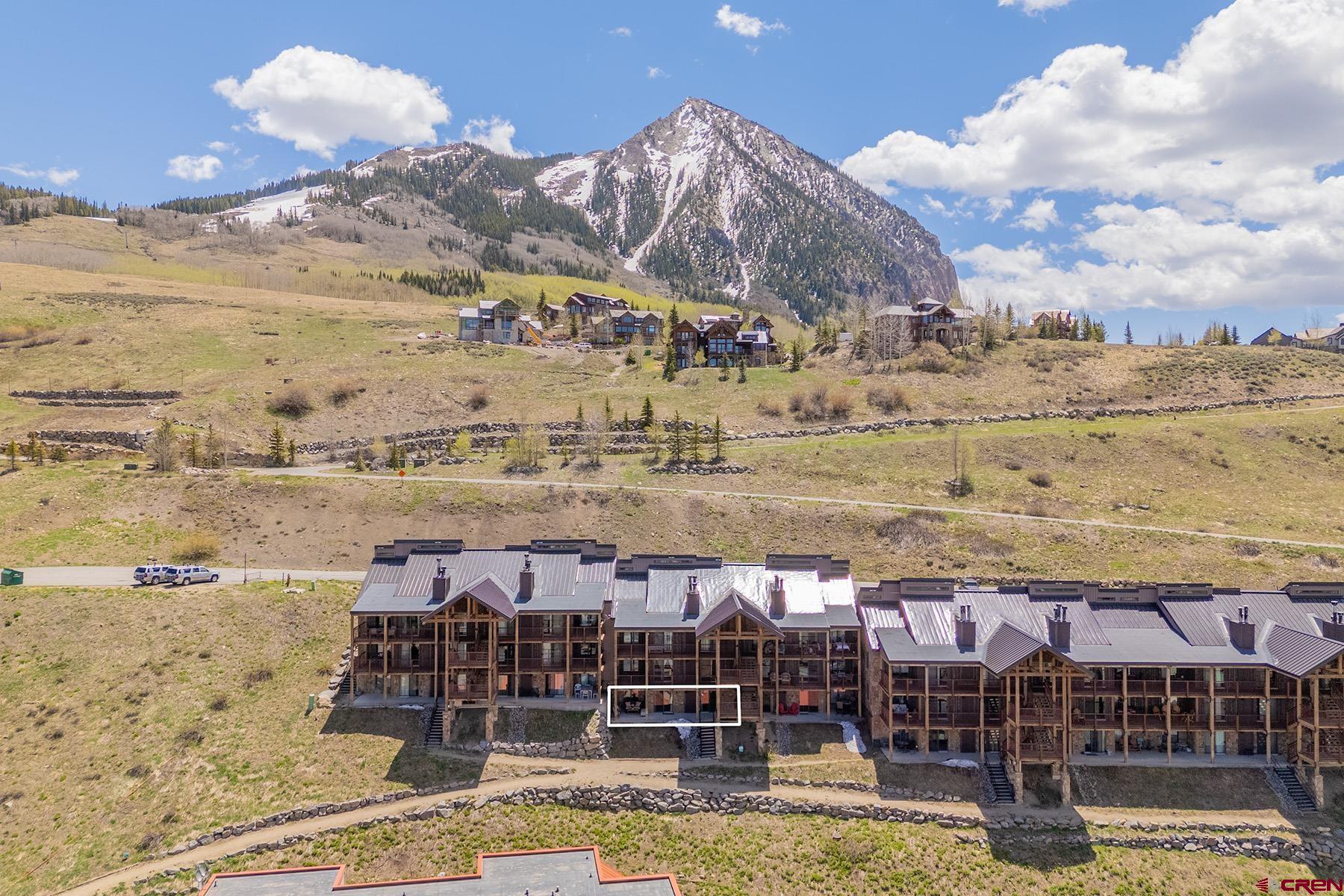 72 Hunter Hill Road, Unit I103 Crested Butte, CO 81225 - Photo 3 of 35 a view of a water building and ocean view