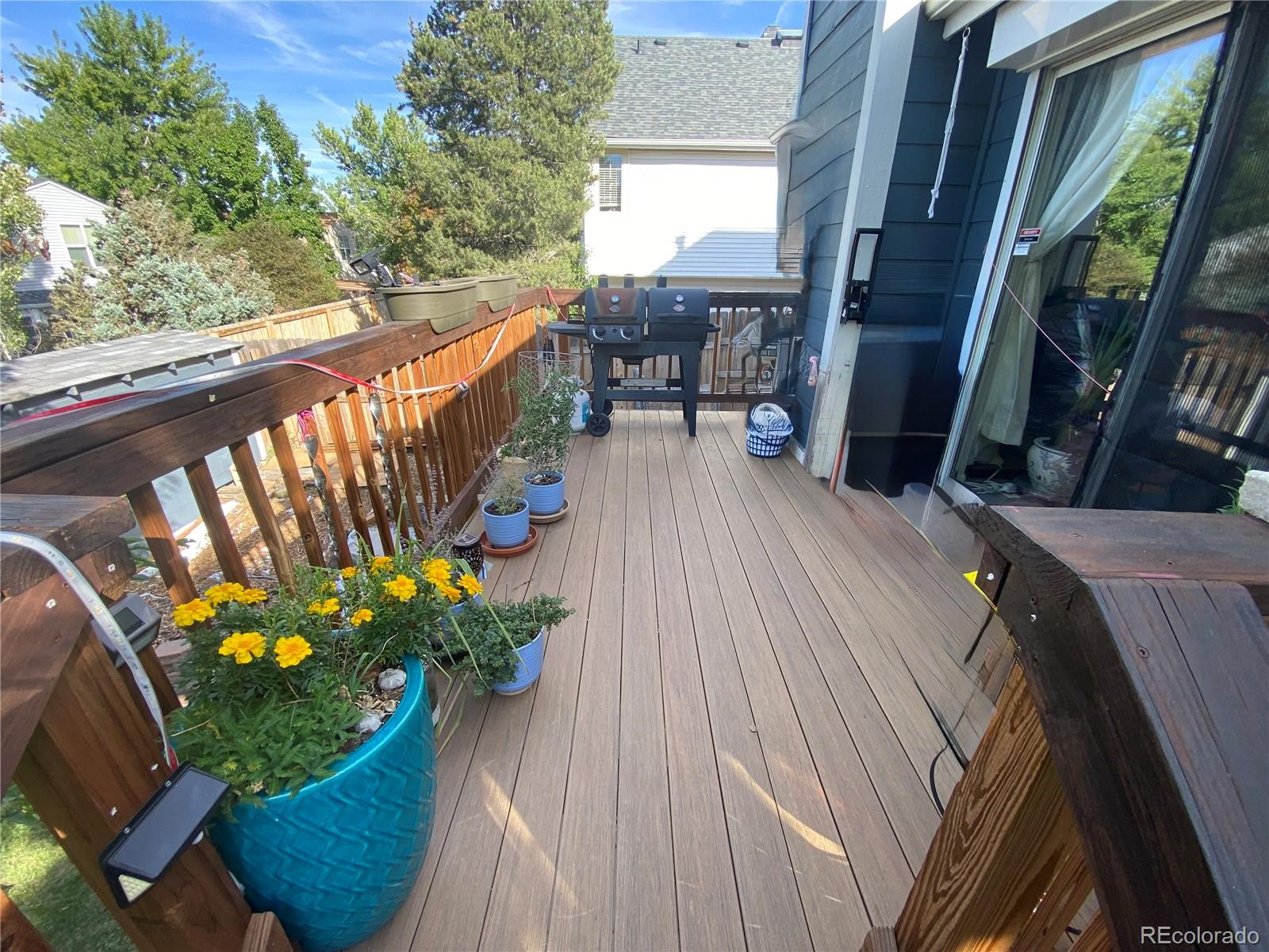 3615 South Flanders Street Aurora, CO 80013 - Photo 26 of 30 a view of a balcony with wooden floor