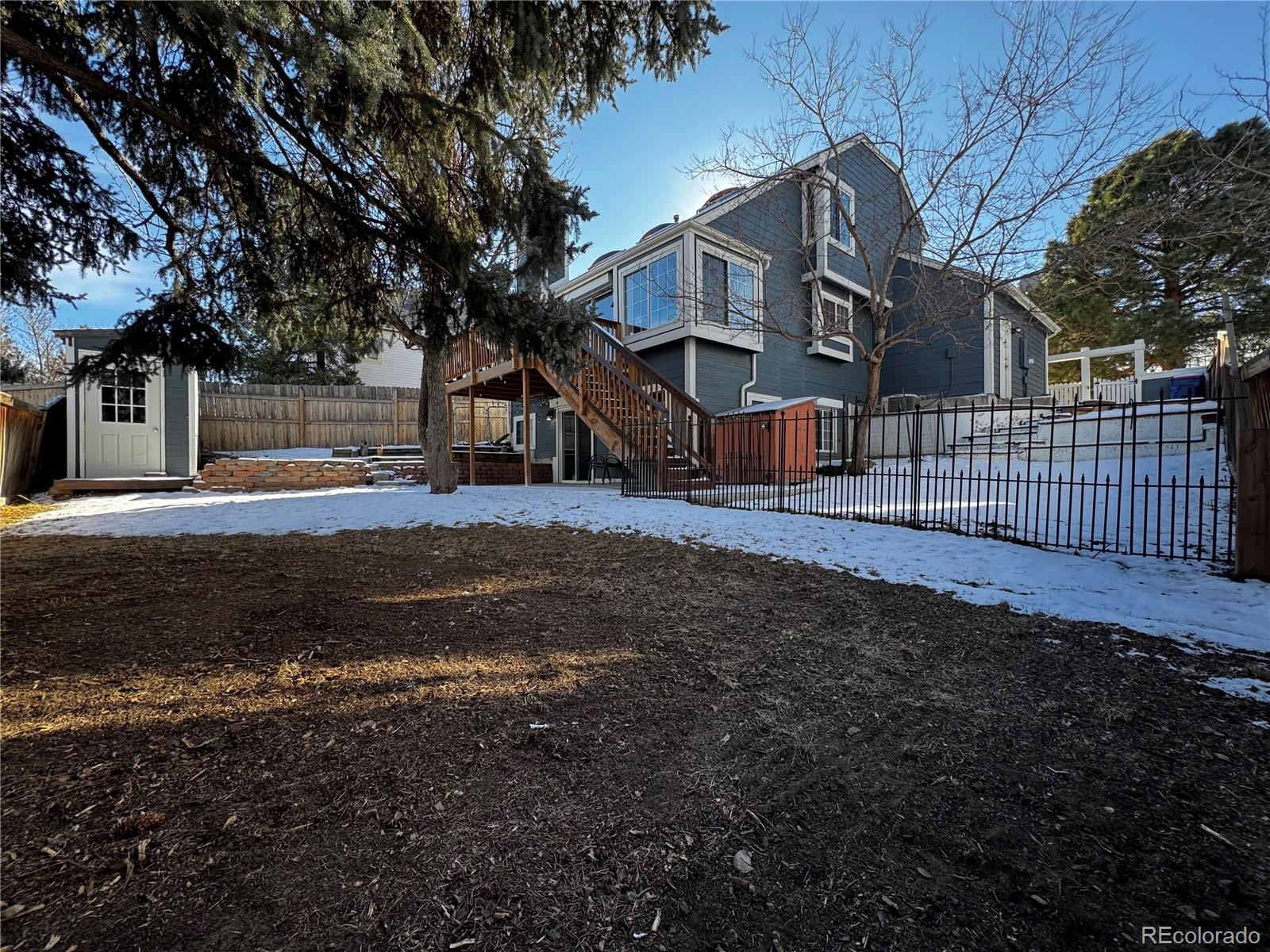 3615 South Flanders Street Aurora, CO 80013 - Photo 28 of 30 a view of a house with a yard