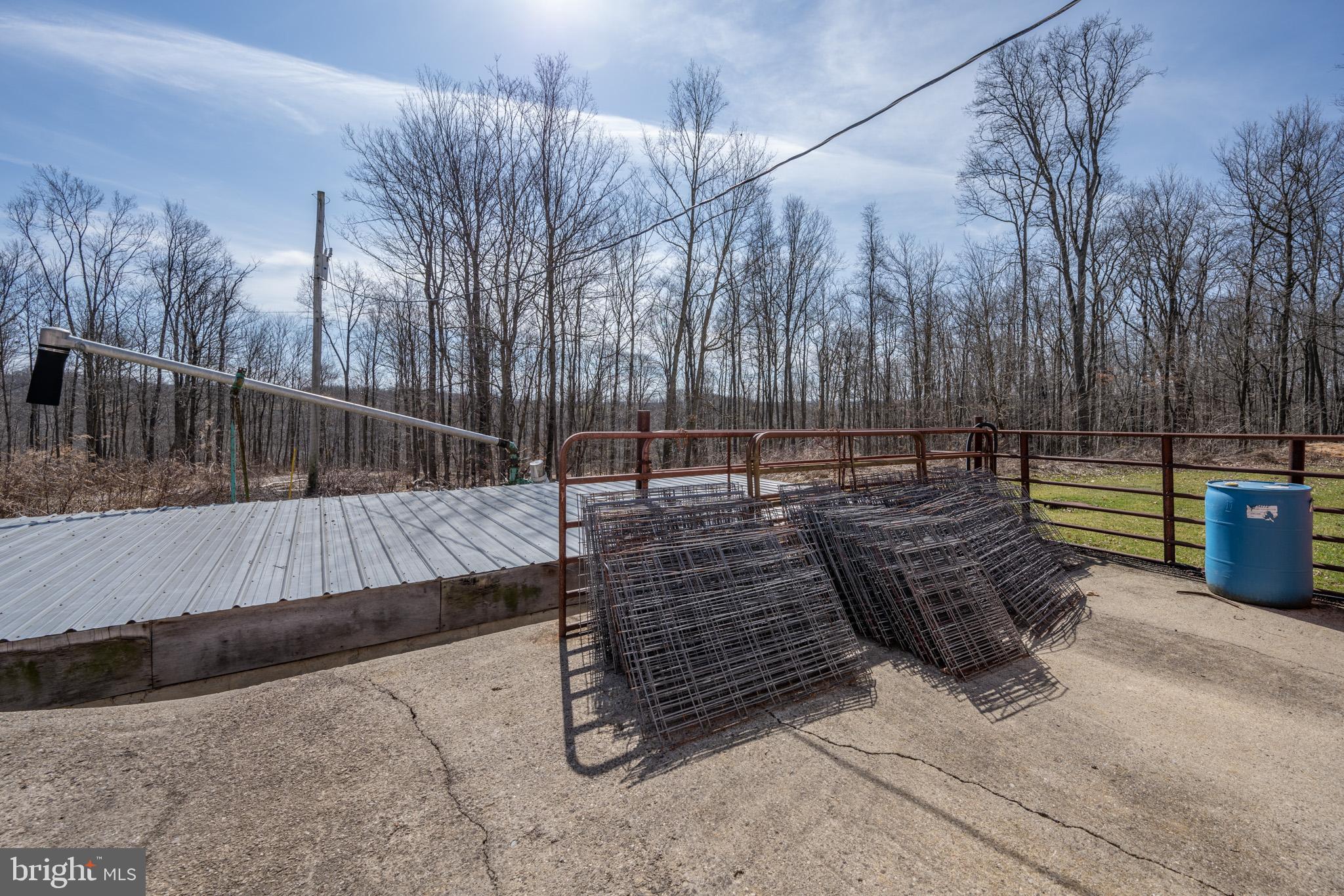 616 Crab Run Road Grantsville, MD 21536 - Photo 23 of 43 a view of outdoor space with deck and tree