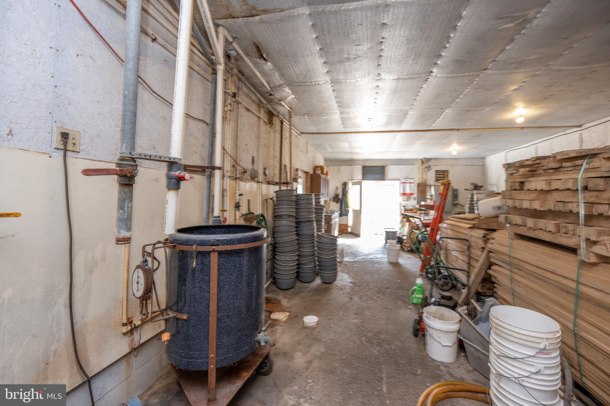 616 Crab Run Road Grantsville, MD 21536 - Photo 29 of 43 a view of a storage room with washer and dryer