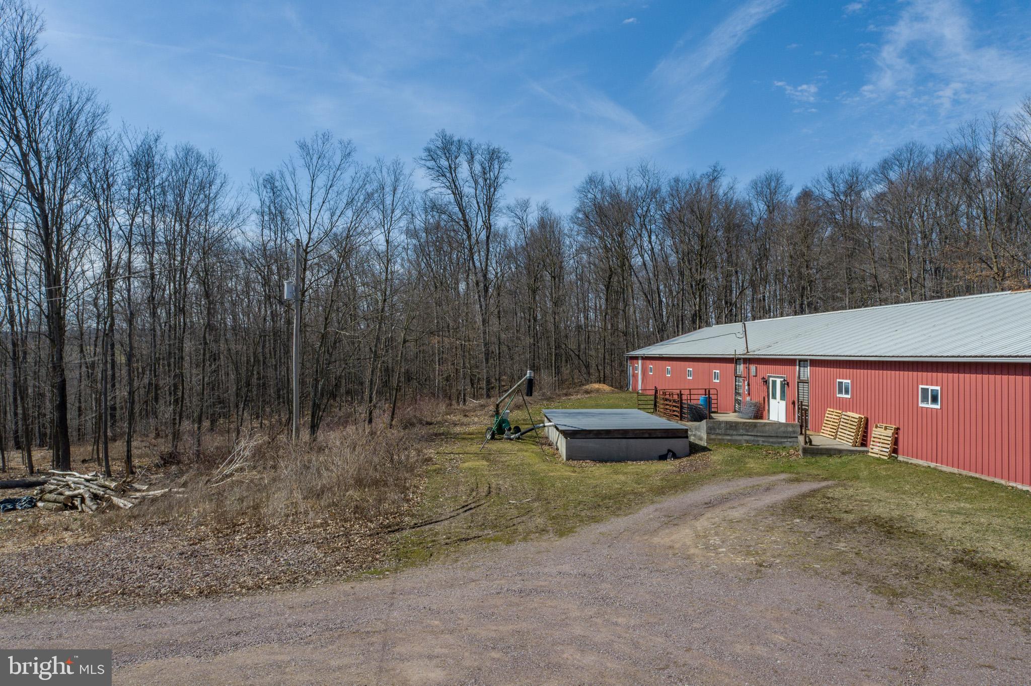 616 Crab Run Road Grantsville, MD 21536 - Photo 3 of 43 a backyard of a house with table and chairs