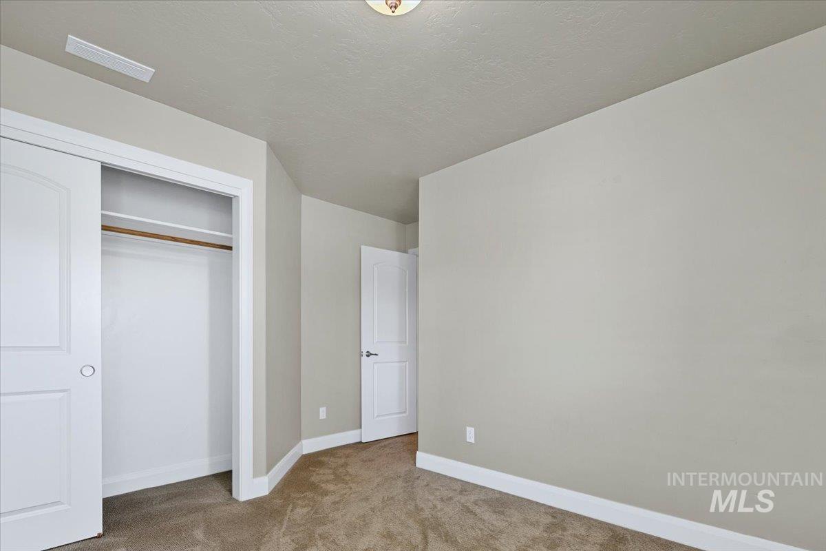 5850 West Rotherham Drive Eagle, ID 83616 - Photo 19 of 50 Main Floor Bedroom