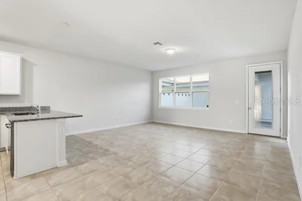 a view of a kitchen with a sink