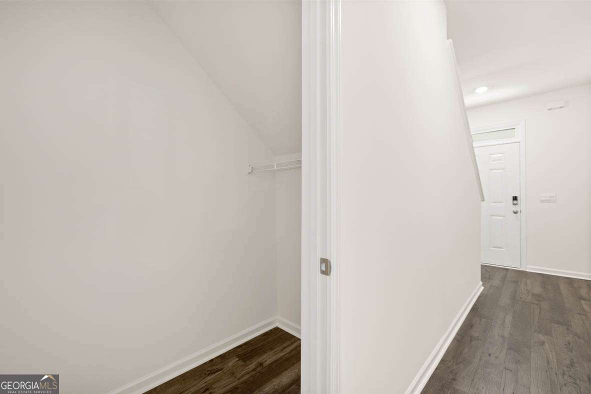 6010 Knickerbocker Street, Unit 135 Mableton, GA 30126 - Photo 14 of 17 a small space with wooden floor