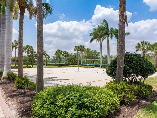 a view of a tennis court with a basket ball court