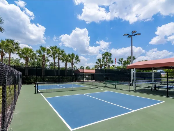 a view of a street with a sign board