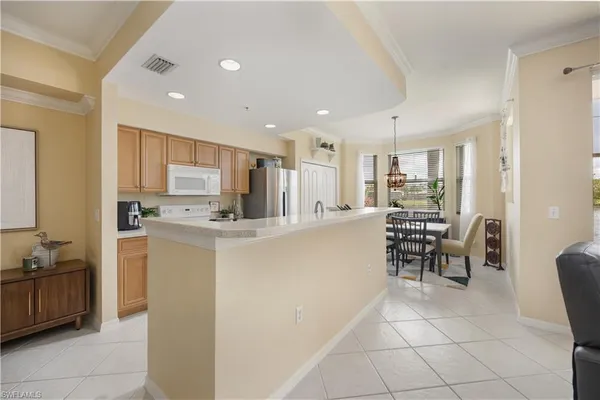 a view of a dining room with furniture window and outside view