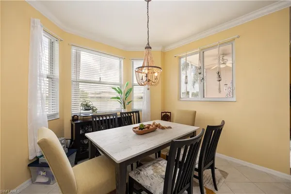 a large kitchen with stainless steel appliances lots of counter space and a sink
