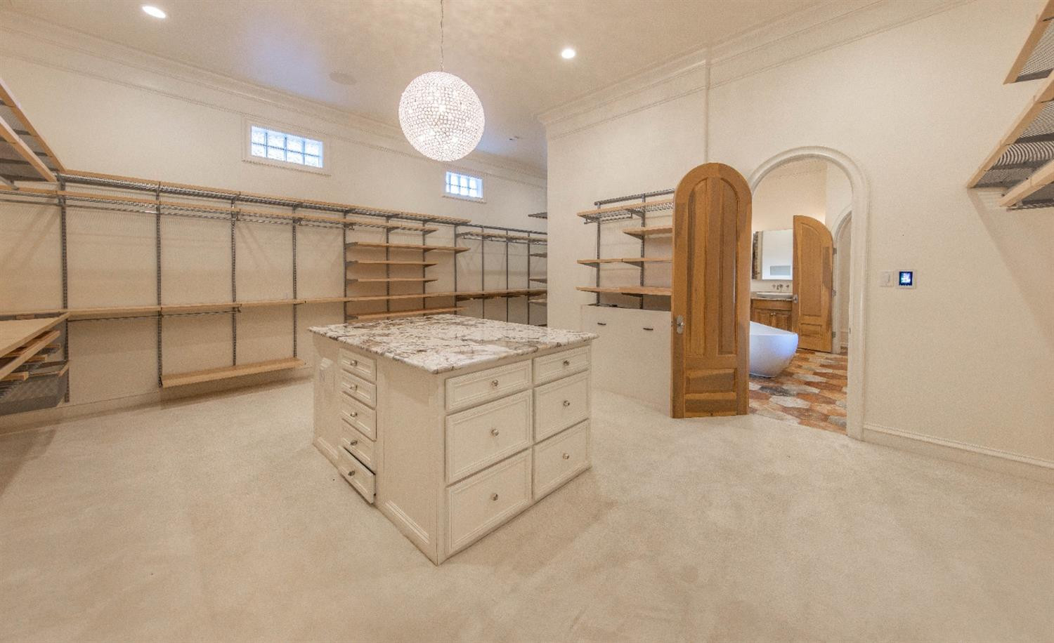201 Juniper Drive Lamesa, TX 79331 - Photo 15 of 45 a view of cabinets with wooden floor