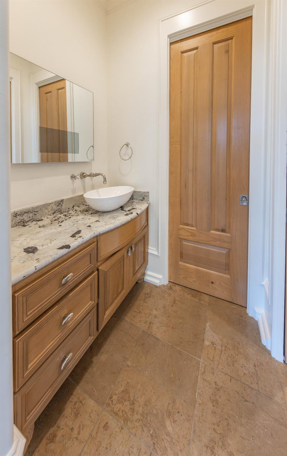 201 Juniper Drive Lamesa, TX 79331 - Photo 22 of 45 a bathroom with a sink and a mirror