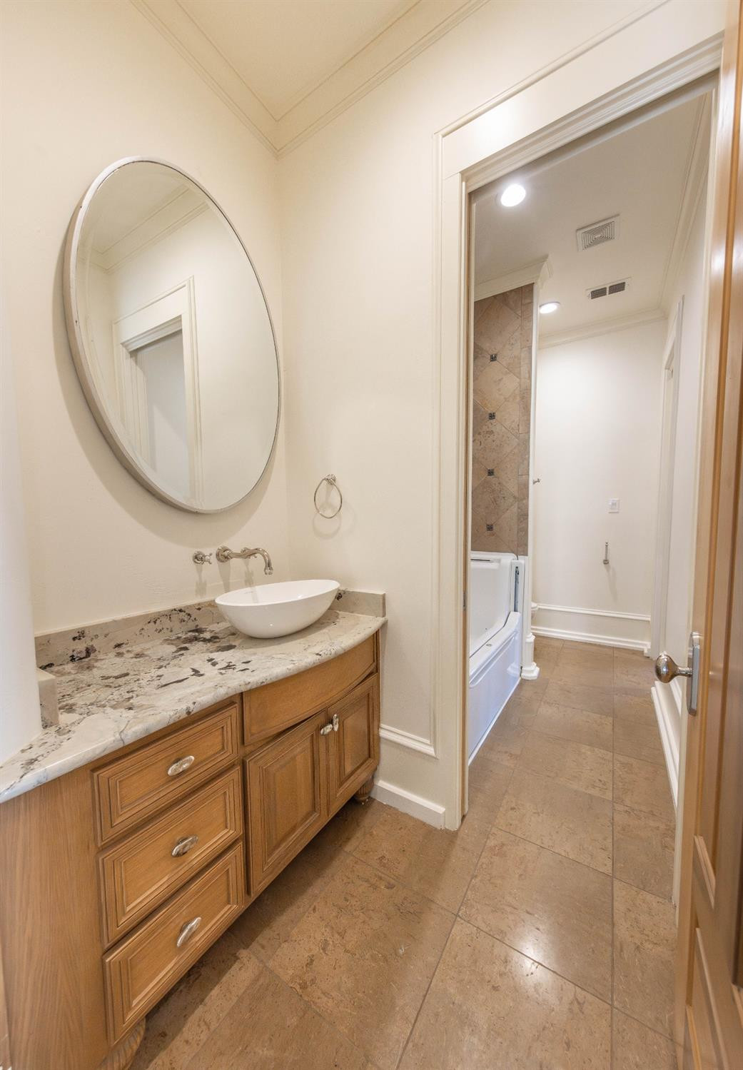 201 Juniper Drive Lamesa, TX 79331 - Photo 23 of 45 a bathroom with a sink and a mirror