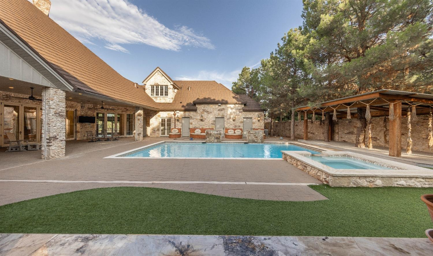 201 Juniper Drive Lamesa, TX 79331 - Photo 33 of 45 a view of a house with a swimming pool