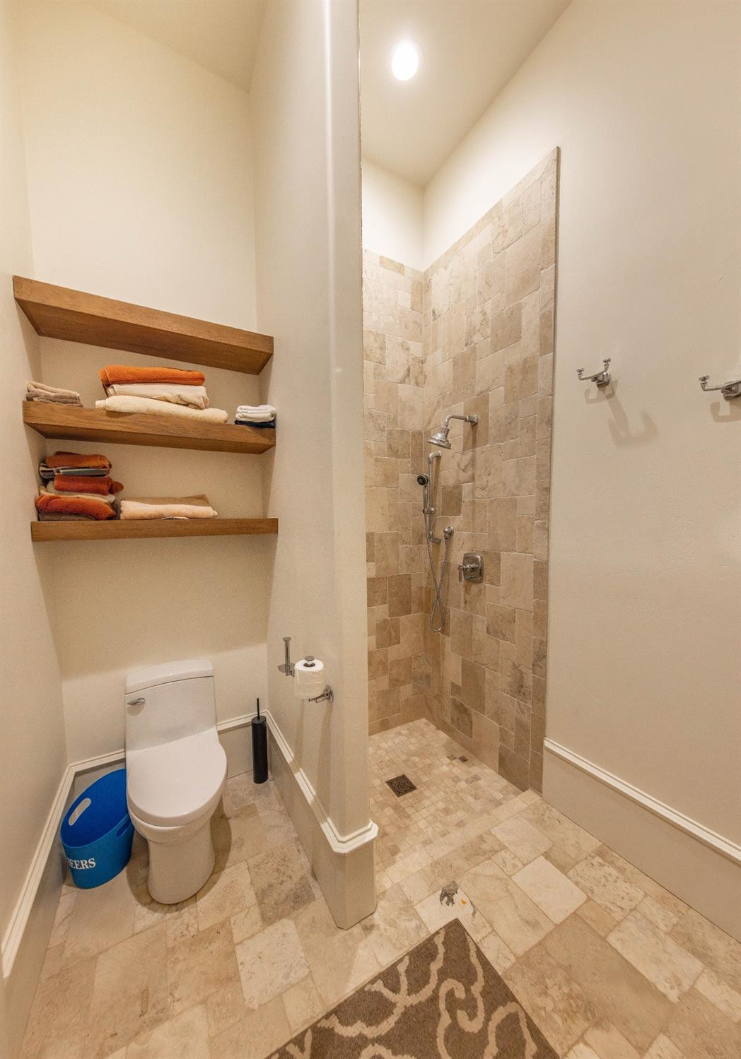 201 Juniper Drive Lamesa, TX 79331 - Photo 40 of 45 a bathroom with a toilet and a shower